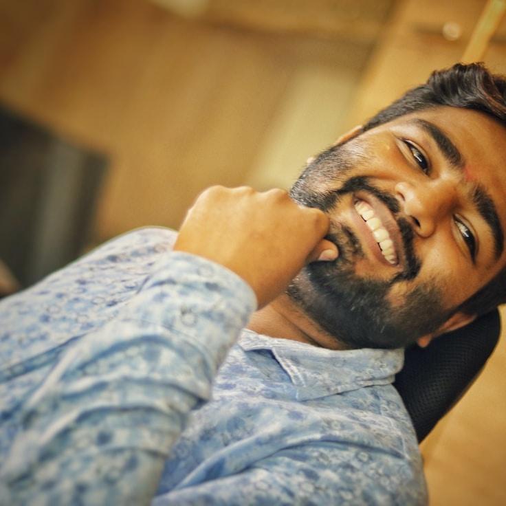 Ava Chen, Lead Design Curator at Primrose & Co., reviewing corporate floral arrangements